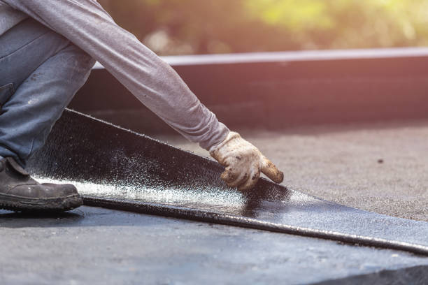 Professional Basement Waterproofing technician working in Freeport, NY